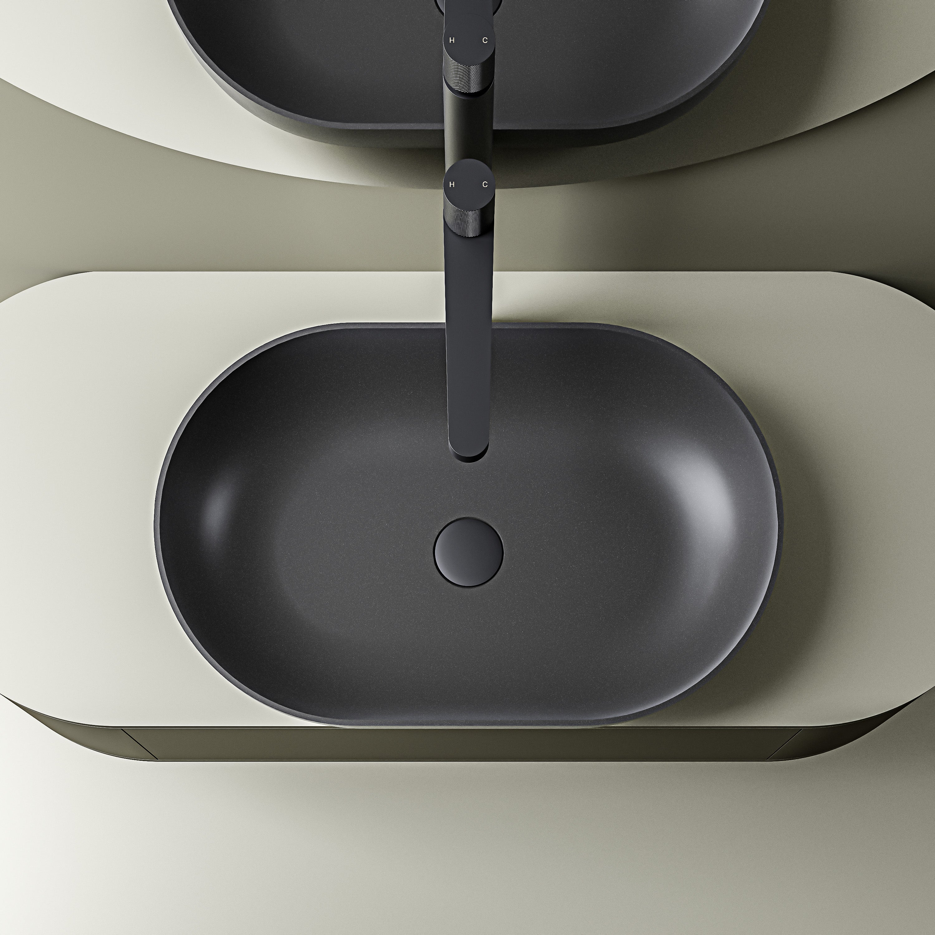 Vasque à poser ovale noir mat en résine minérale – 53 cm